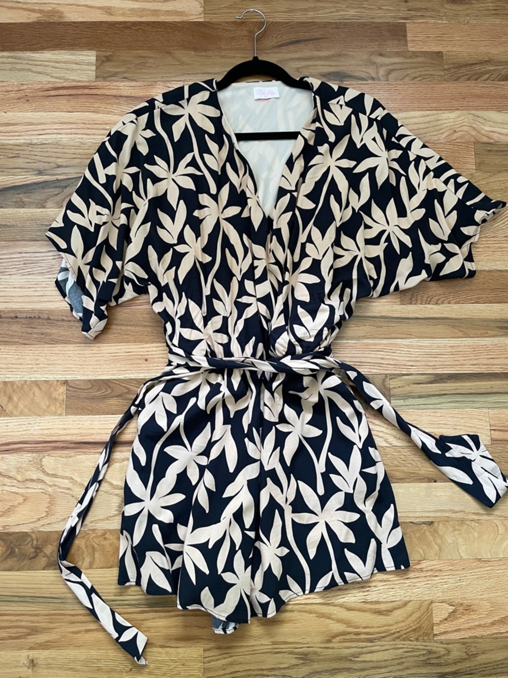 Pink Lily Black and Cream Floral Tie-Waist Romper